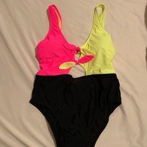 Adorable neon/black one piece